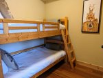 Twin over twin bunk bed in private den bedroom.